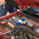 We stole a battery from a Nissan that was already out of the race to make it to the end. Only try this with a sealed battery, though, as this isn’t how a battery is supposed to fit.